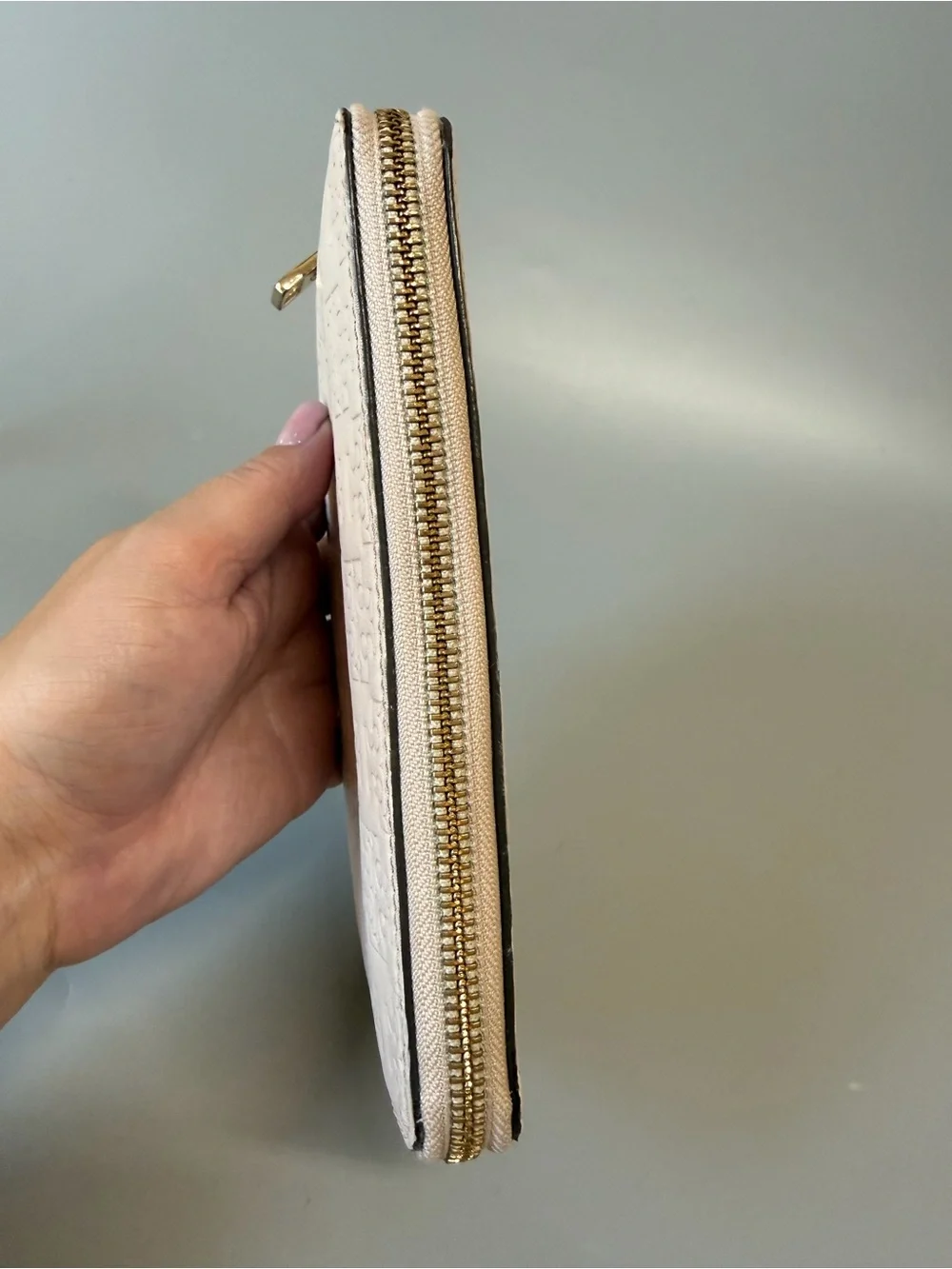 Tory Burch Leather Embossed Monogram zip wallet Off white